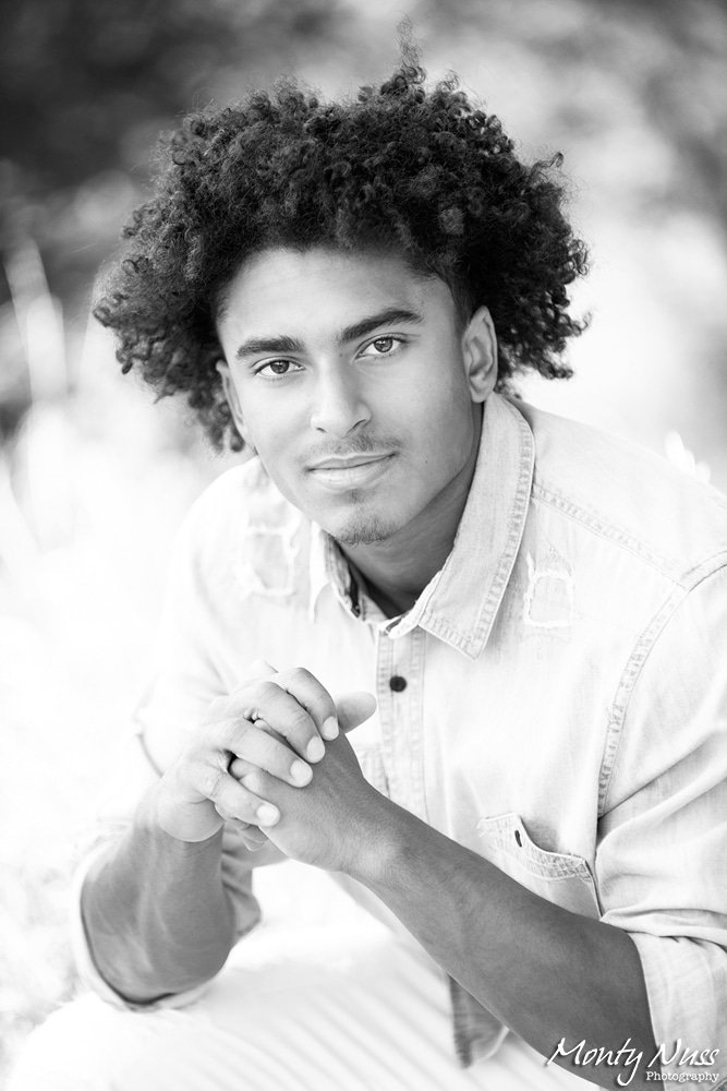 black and white outside man curly hair senior littleton photography